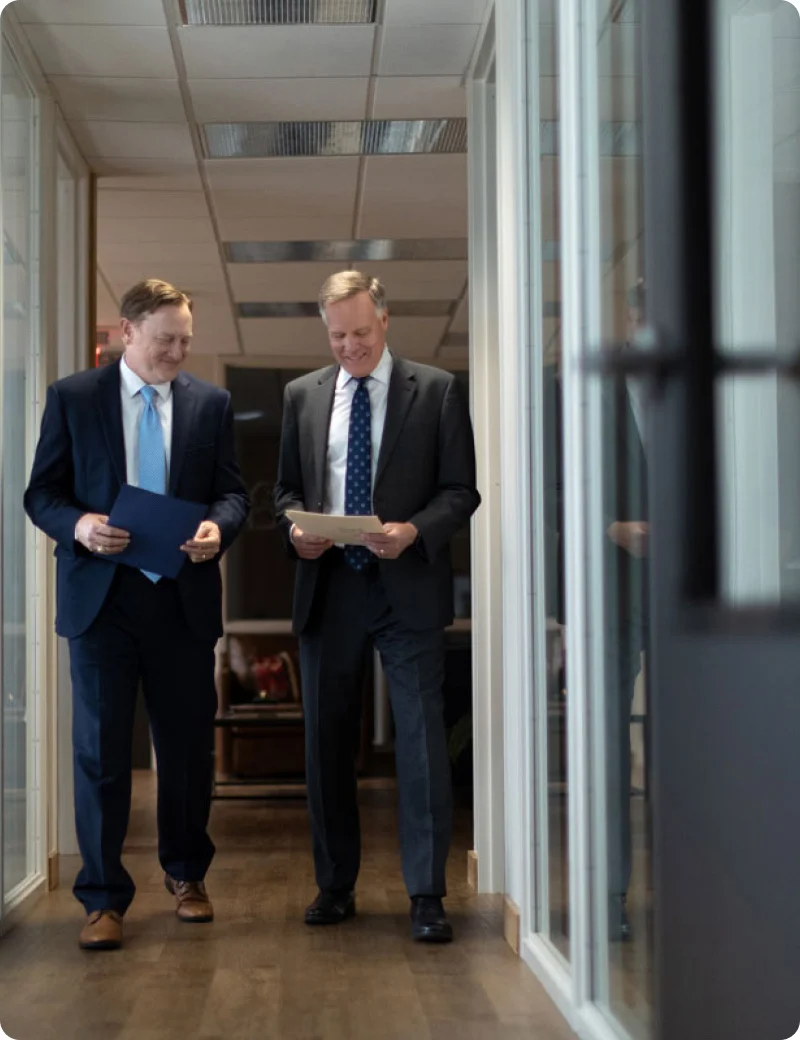 Ramey Flock attorneys walking the office hallway
